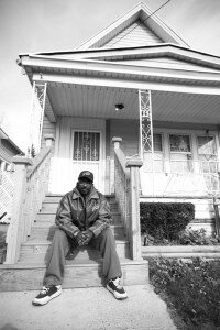 Joseph Thomas Jr. in front of his house in Buffalo