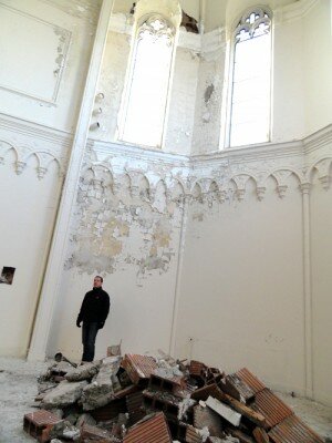 st-matthews-david-torke-1 David Torke of fixBuffalo stands amid rubble inside St. Matthew's