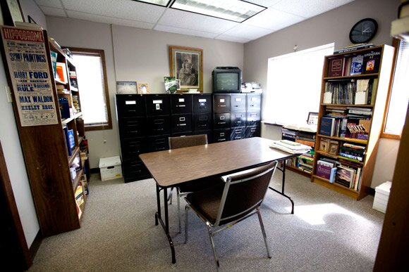 joe-nickell-situation-room office with a large table in the center and file cabinets in the back